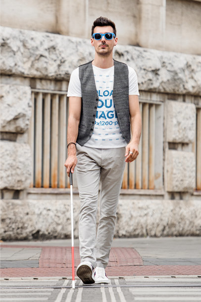 T-Shirt Mockup Featuring a Visually Impaired Man