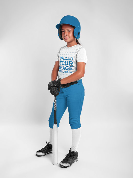 Custom Softball Jerseys - Girl Wearing her Uniform While Standing at a Studio
