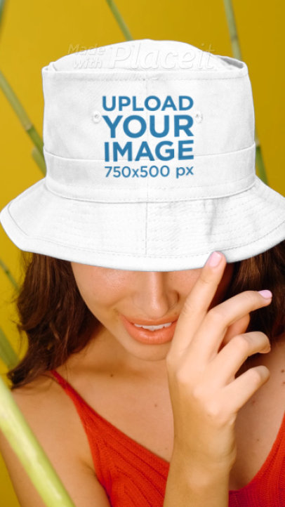 Video of a Woman Wearing a Customizable Bucket Hat at a Studio