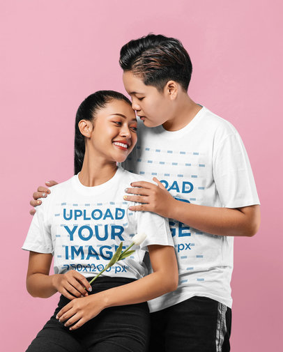 Valentine's Day Mockup Featuring Two Smiling Women Wearing Tees and Posing at a Studio