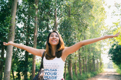 Tank Top Mockup of a Joyful Woman with Her Arms Wide Open