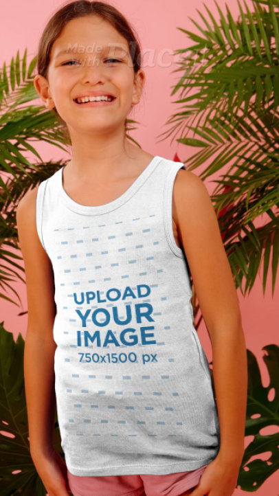 Tank Top Video of a Smiling Girl Posing by Palm Leaves