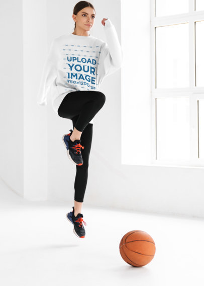 Activewear Mockup of a Woman With a Sweatshirt Jumping 