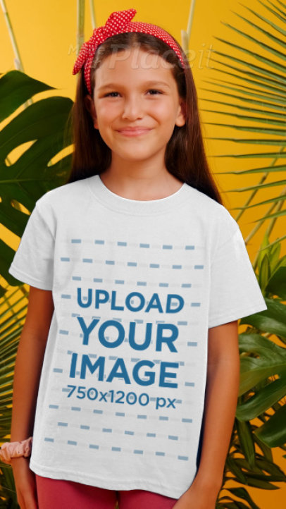 Round-Neck Tee Video of a Little Girl Surrounded by Tropical Leaves