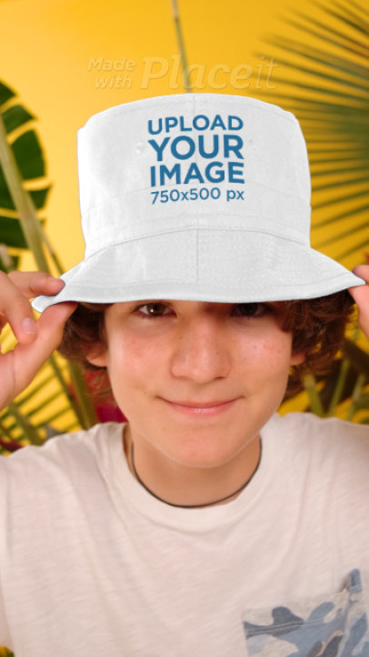 Video Featuring a Happy Boy Wearing a Customizable Bucket Hat