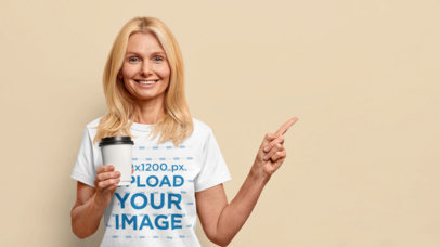 T-Shirt Mockup Featuring a Middle-Aged Woman Pointing Her Finger