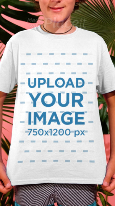 T-Shirt Video of a Smiling Kid Posing by Palm Tree Leaves