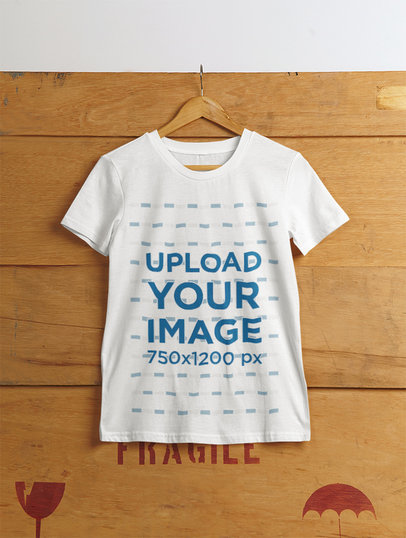 Mockup of a T-Shirt Presented on a Wooden Cargo Box Background