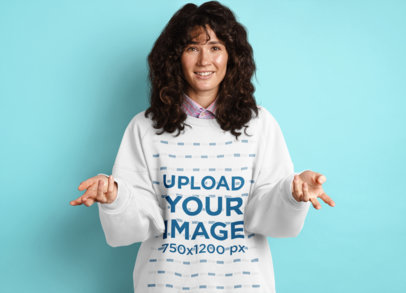 Mockup Featuring a Confused Young Woman Wearing a Sweatshirt at a Studio