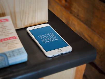 Mockup of an iPhone 6 on Small Business Counter