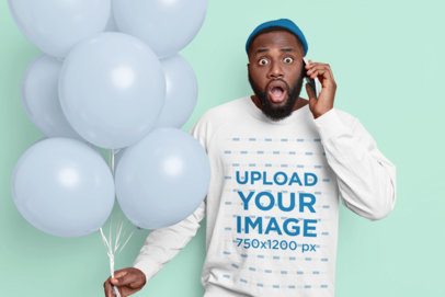 Long Sleeve T-Shirt Mockup of a Man with a Surprised Facial Expression Holding Balloons