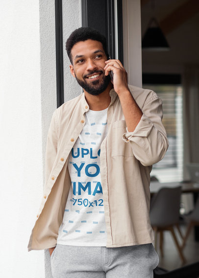 T-Shirt Mockup of a Bearded Man Talking on the Phone