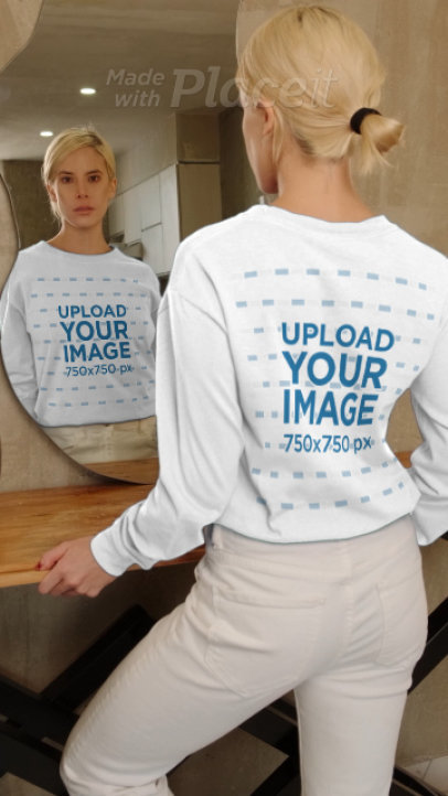 Long Sleeve Tee Video Featuring a Serious Woman Standing in Front of a Mirror 