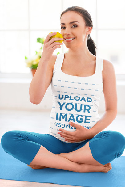 Tank Top Mockup of a Pregnant Woman Eating an Apple in a Yoga Studio m10012-r-el2