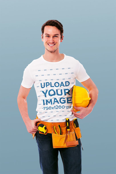 Round-Neck Tee Mockup of a Smiling Worker Holding a Construction Helmet