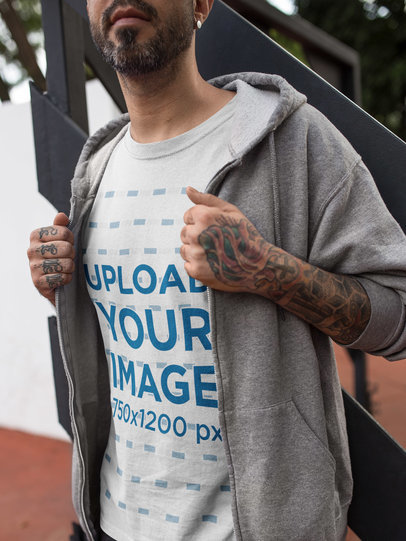 Close Up of a Tattooed Man Wearing a T-Shirt Mockup and a Sweatshirt a16985