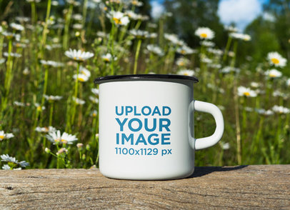 Mockup of an Enamel Mug Surrounded by a Daisy Field m9246 r-el2