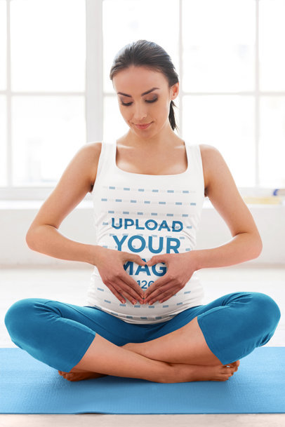 Tank Top Mockup of a Pregnant Woman Drawing a Heart with Her Hands on Her Belly m10014-r-el2
