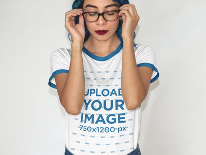 Pretty Edgy Woman Wearing a Ringer T-Shirt Mockup While Holding her Glasses