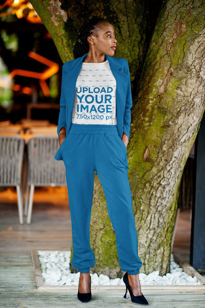 T-Shirt Mockup Featuring a Stylish Woman Posing by a Tree m16087 r-el2