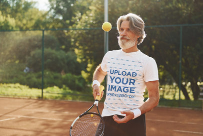 T-Shirt Mockup of a Middle-Aged Man Playing Tennis