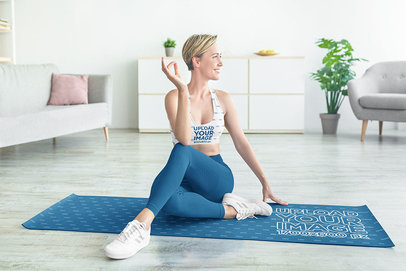 Mockup of a Woman in a Sublimated Sports Bra Doing Yoga at Home