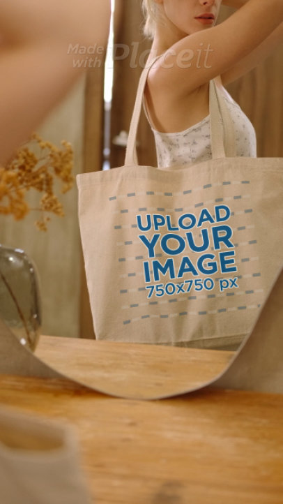 Tote Bag Video Featuring a Woman Posing in Front of a Mirror