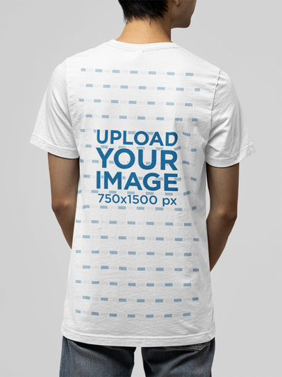 Back-View Mockup of a Man Wearing a Bella Canvas T-Shirt