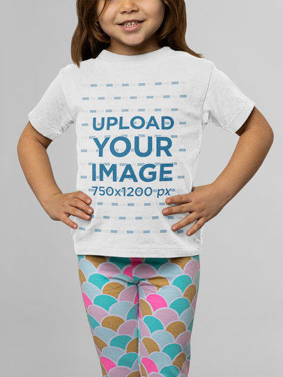 Round Neck Tee Mockup of a Little Girl Posing at a Studio