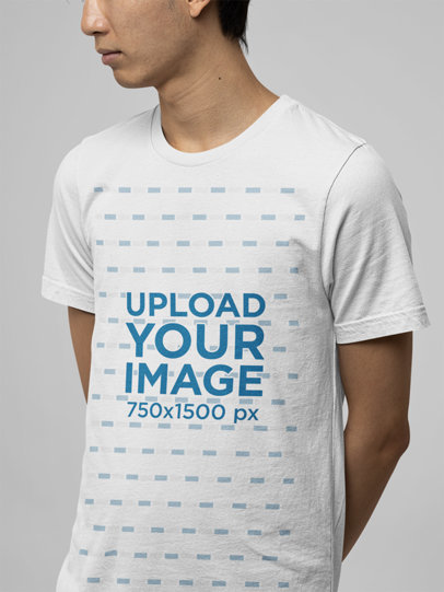 Round-Neck Bella Canvas Tee Mockup Featuring a Man at a Studio