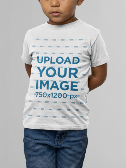 Mockup of a Little Boy Wearing a Heather Short Sleeve Bella Canvas Tee