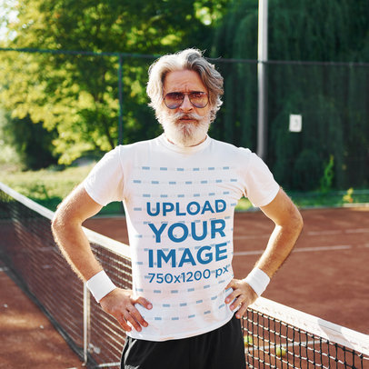 T-Shirt Mockup of a Bearded Man at a Tennis Court