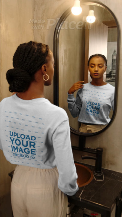 Long Sleeve Tee Video Featuring a Woman Posing in Front of a Mirror