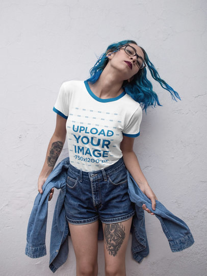 Woman Wearing a Round Neck Ringer Tee Mockup While Against a White Wall