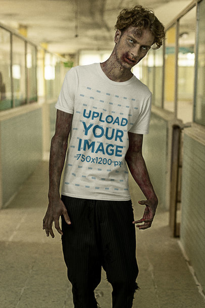 T-Shirt Mockup Featuring a Zombie Walking in Through an Abandoned Hospital