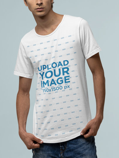 Mockup of a Man Showing the Front Side of His Bella Canvas T-Shirt