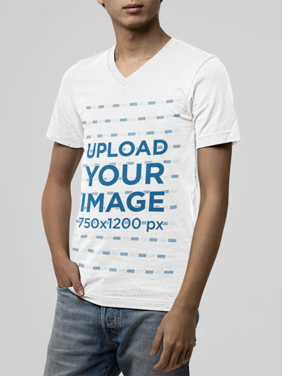 Mockup of a Slim Man Posing with a V-Neck Bella Canvas T-Shirt in a Studio