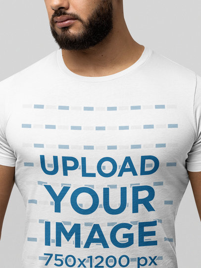 Closeup Mockup of a Bearded Man Wearing a Bella Canvas Round-Neck Tee