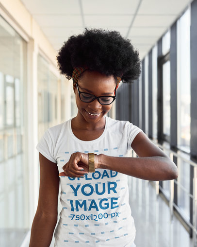 Round-Neck Tee Mockup of a Woman with Glasses Checking the Time