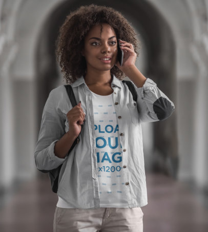 T-Shirt Mockup of a Young Woman Talking on the Phone at School