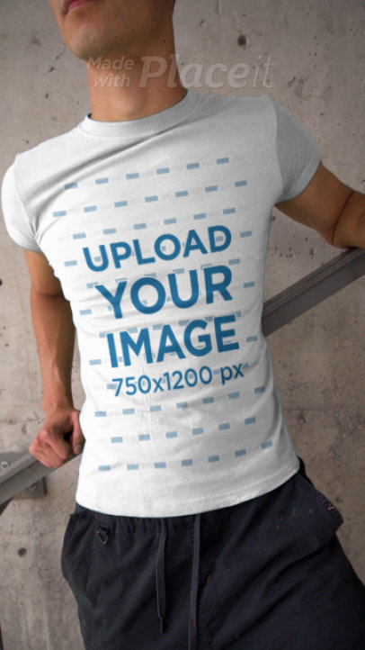 Basic T-Shirt Video Featuring a Young Man Posing on a Stairway 