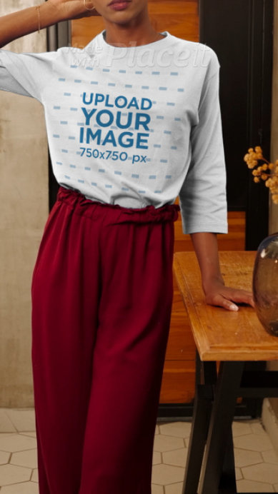 Video of a Woman in a Three-Quarter Sleeve Tee Standing in Front of a Mirror
