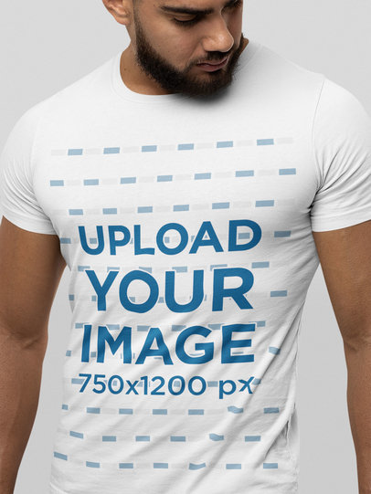 Mockup of a Bearded Man Wearing a Unisex Short Sleeve Tee From Bella Canvas