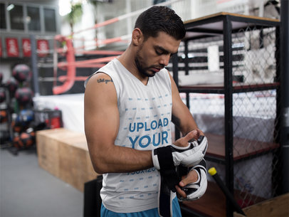 Fitness Mockup of an MMA Fighter Putting his Gloves While Wearing a Sleeveless Shirt