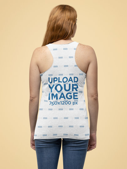 Mockup of the Back of a Woman Posing with a Bella Canvas Tank Top