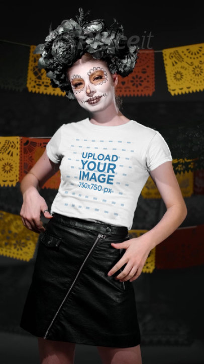 Video of a Woman in a Dia de Muertos Costume Pointing at Her Tee