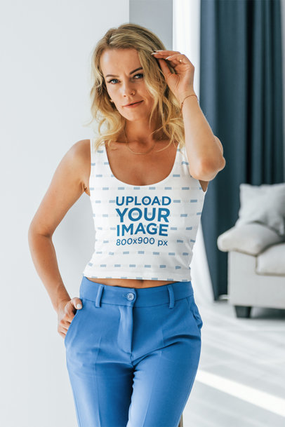 Sublimated Tank Top Mockup Featuring a Woman at Home
