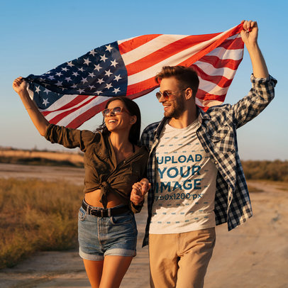 T-Shirt Mockup Featuring a Man and His Girlfriend Holding the USA Flag