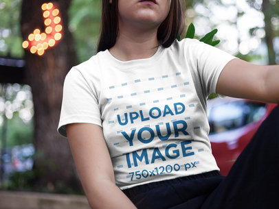 Mockup of a Cropped Face Asian Woman Wearing a Round Neck Tee While Near Trees