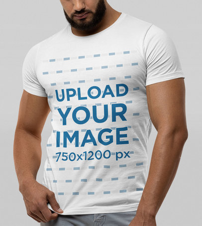 Bella Canvas T-Shirt Mockup Featuring a Bearded Man Against a Plain Backdrop